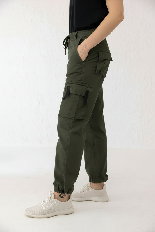 Side view of dark green twill cargo pants for men with utility pockets and adjustable drawstring hem