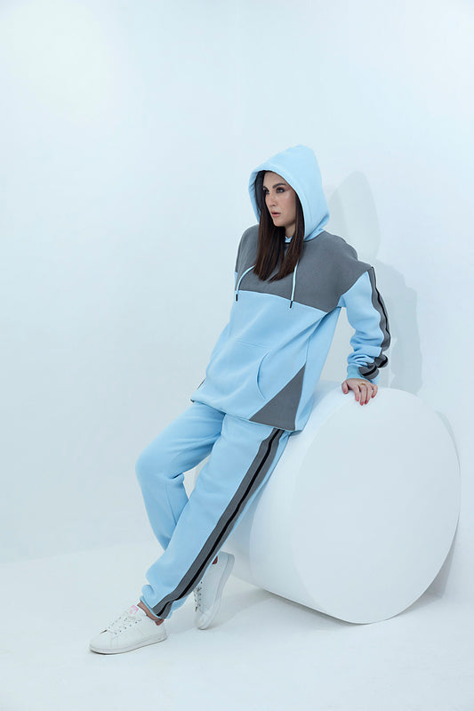 Women's light blue and grey with black lining tracksuit.