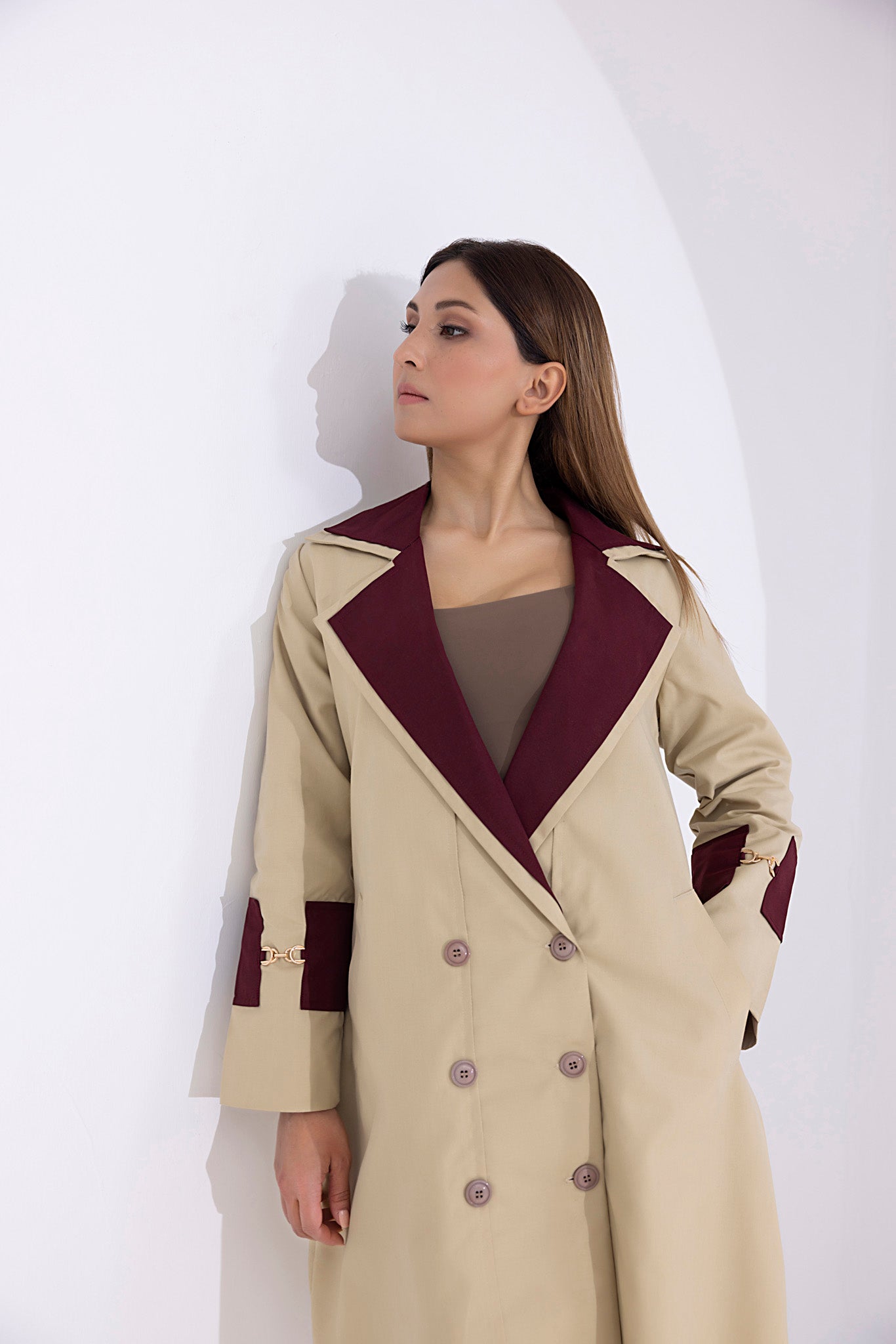 Women's twill elegant light brown and maroon trenchcoat.