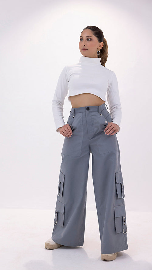 Grey women’s fancy cargo pants with multiple pockets and a tailored fit.