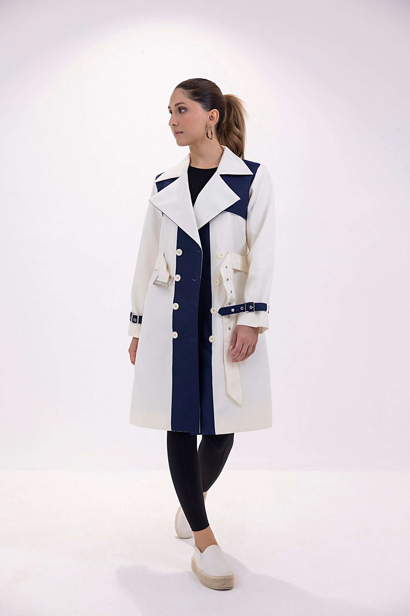 Women's twill navy and white trenchcoat.