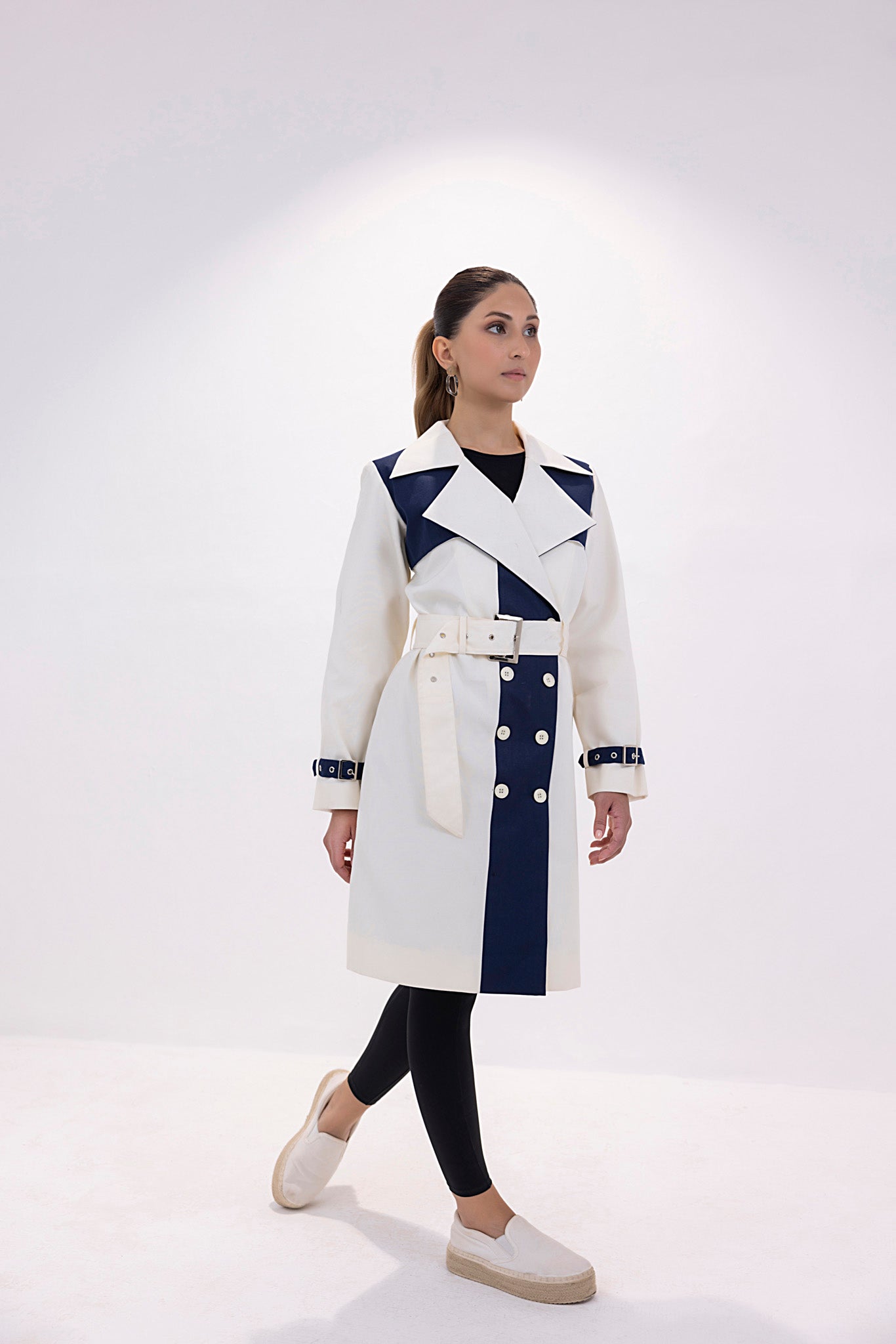 Women's twill navy and white trenchcoat.