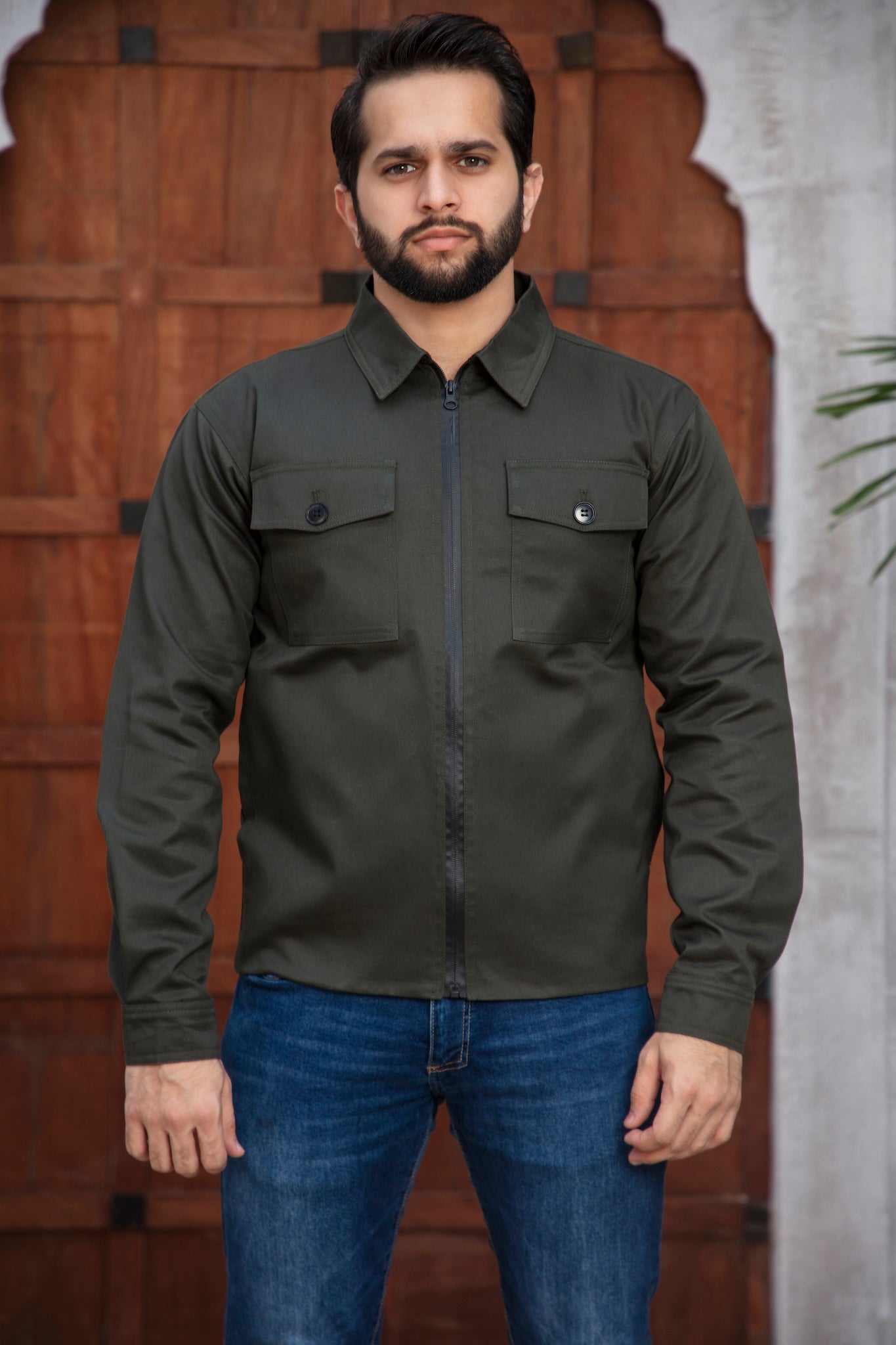 Men wearing green jacket with front pose