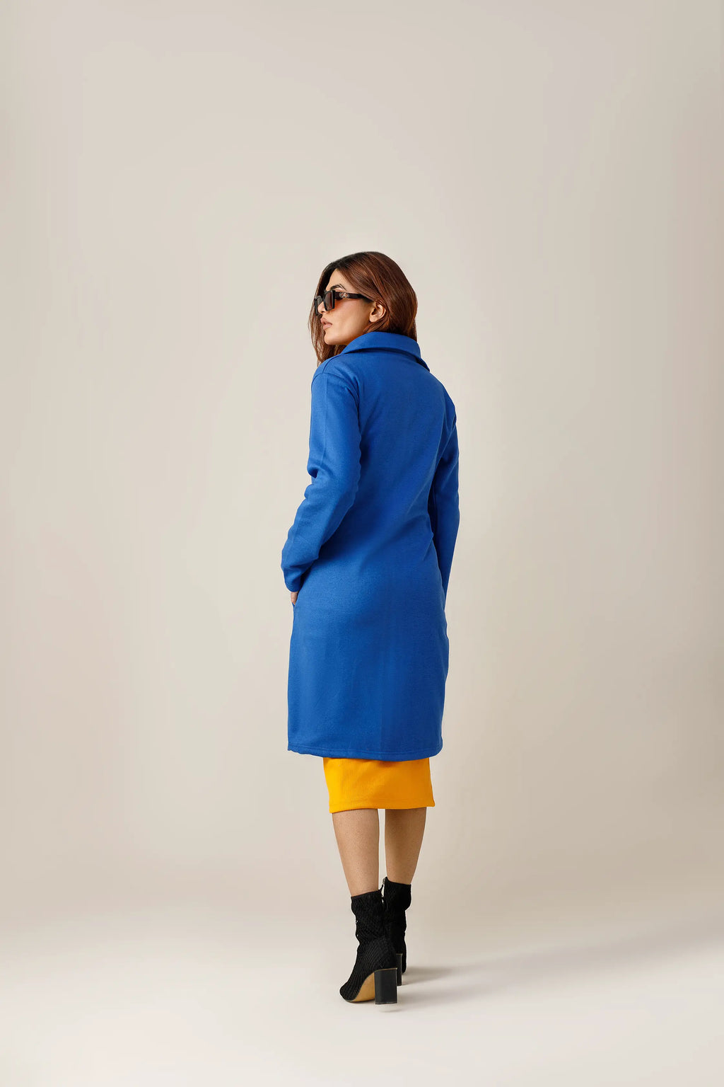 Women's blue long lapel coat.