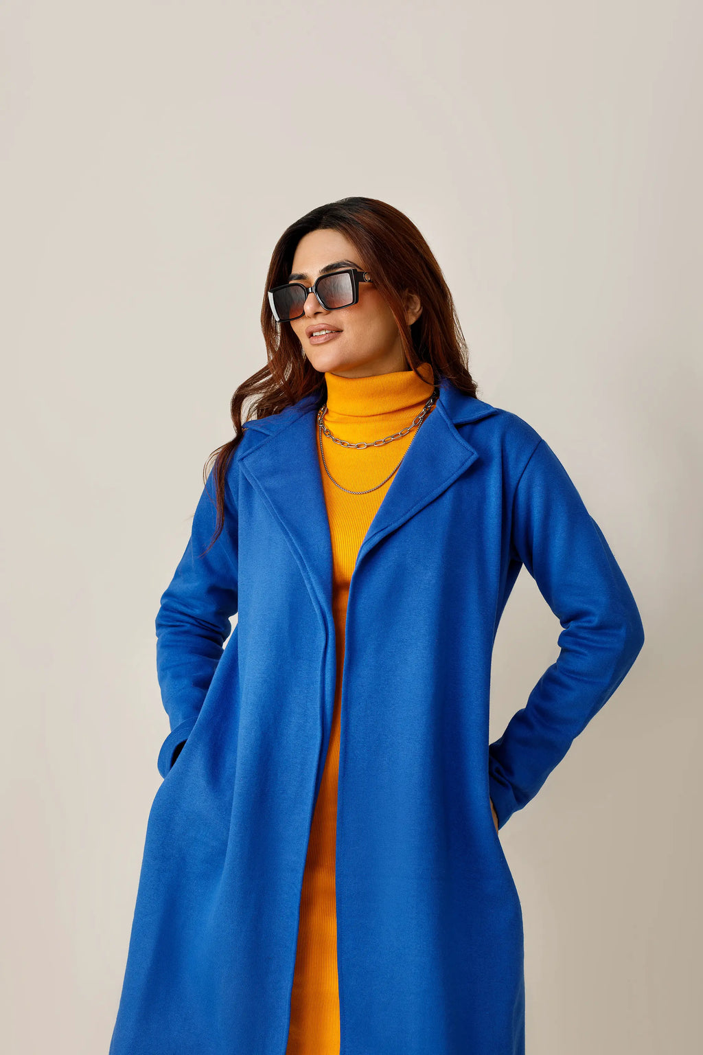 Women's blue long lapel coat.