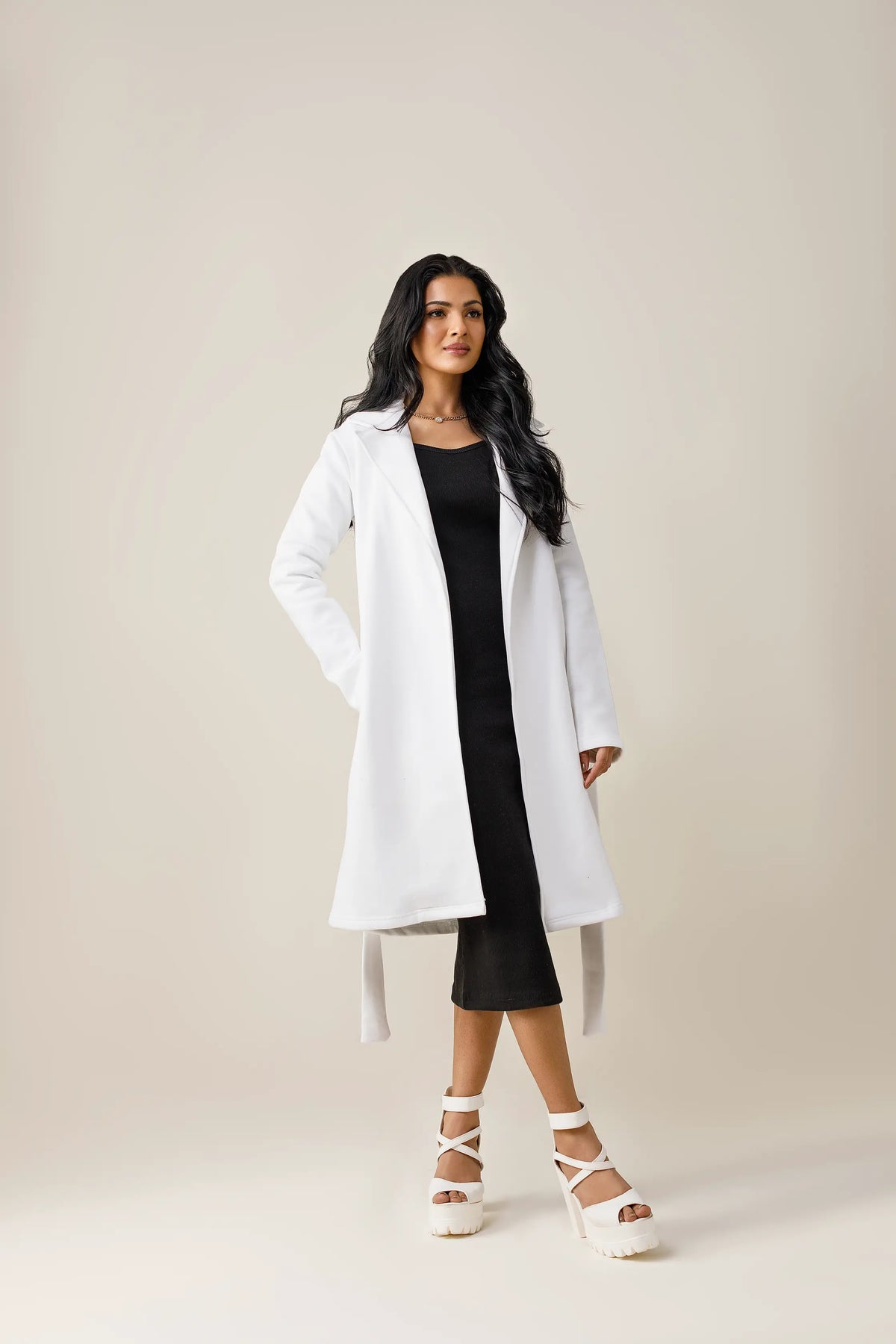 Women's white long lapel coat.