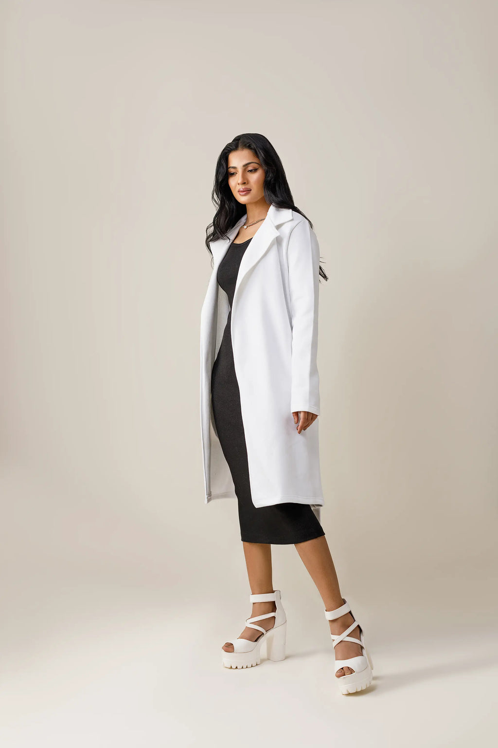 Women's white long lapel coat.