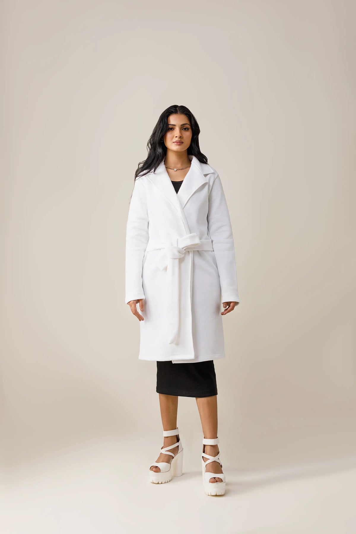 Women's white long lapel coat.