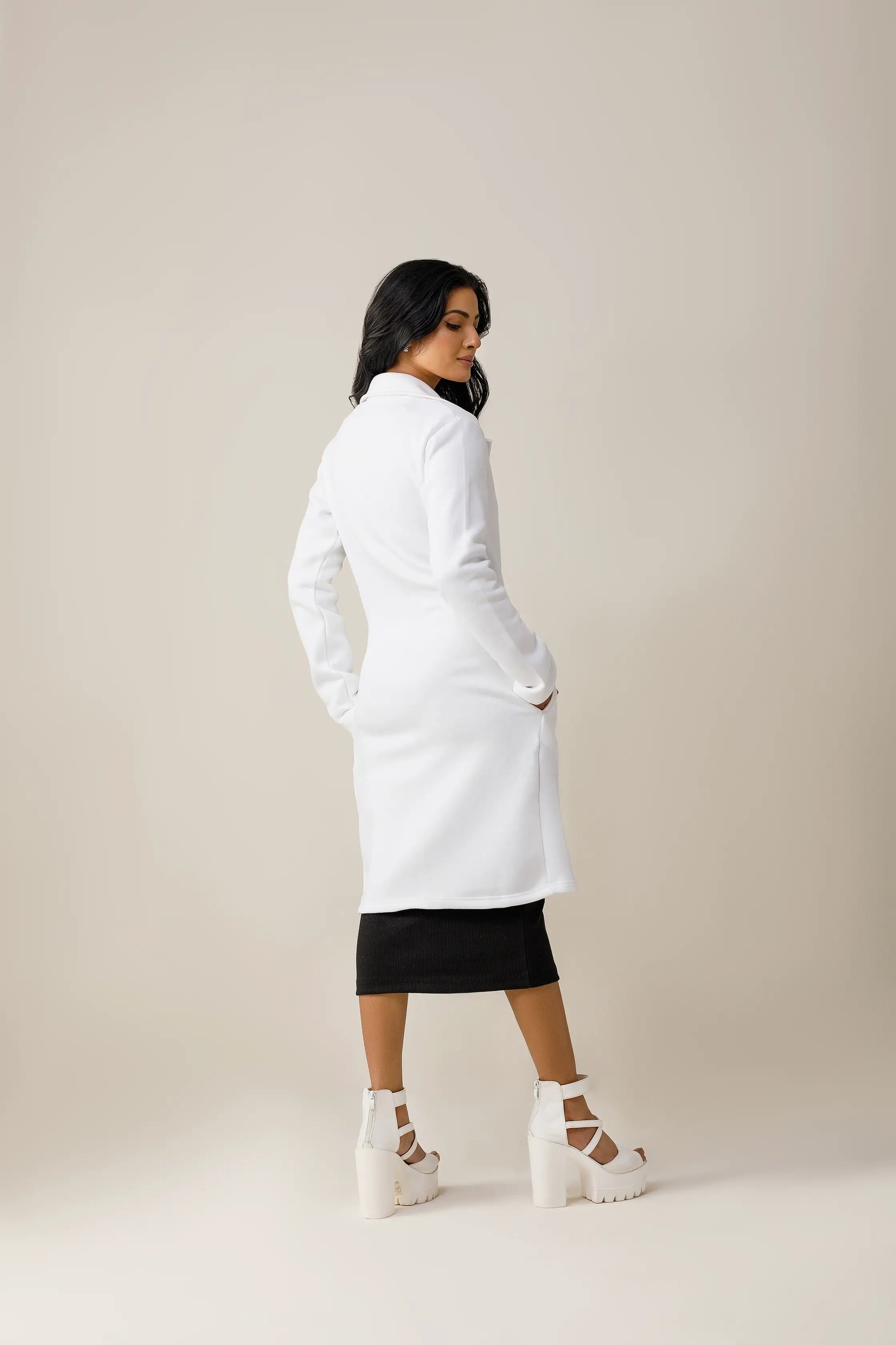 Women's white long lapel coat.