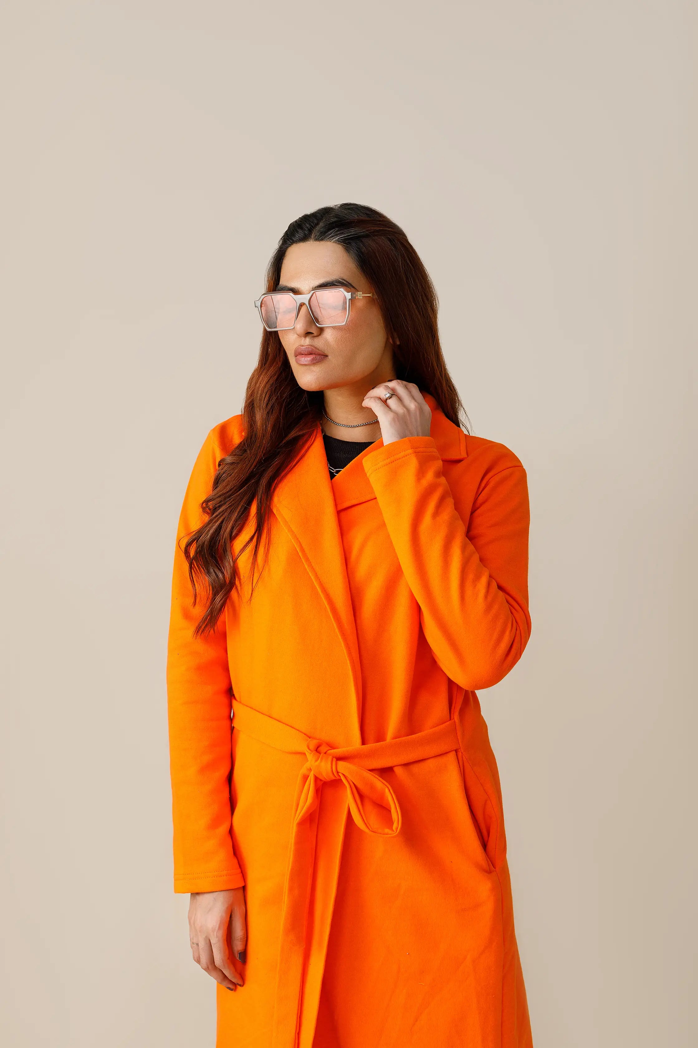 Women's fleece orange long lapel coat.