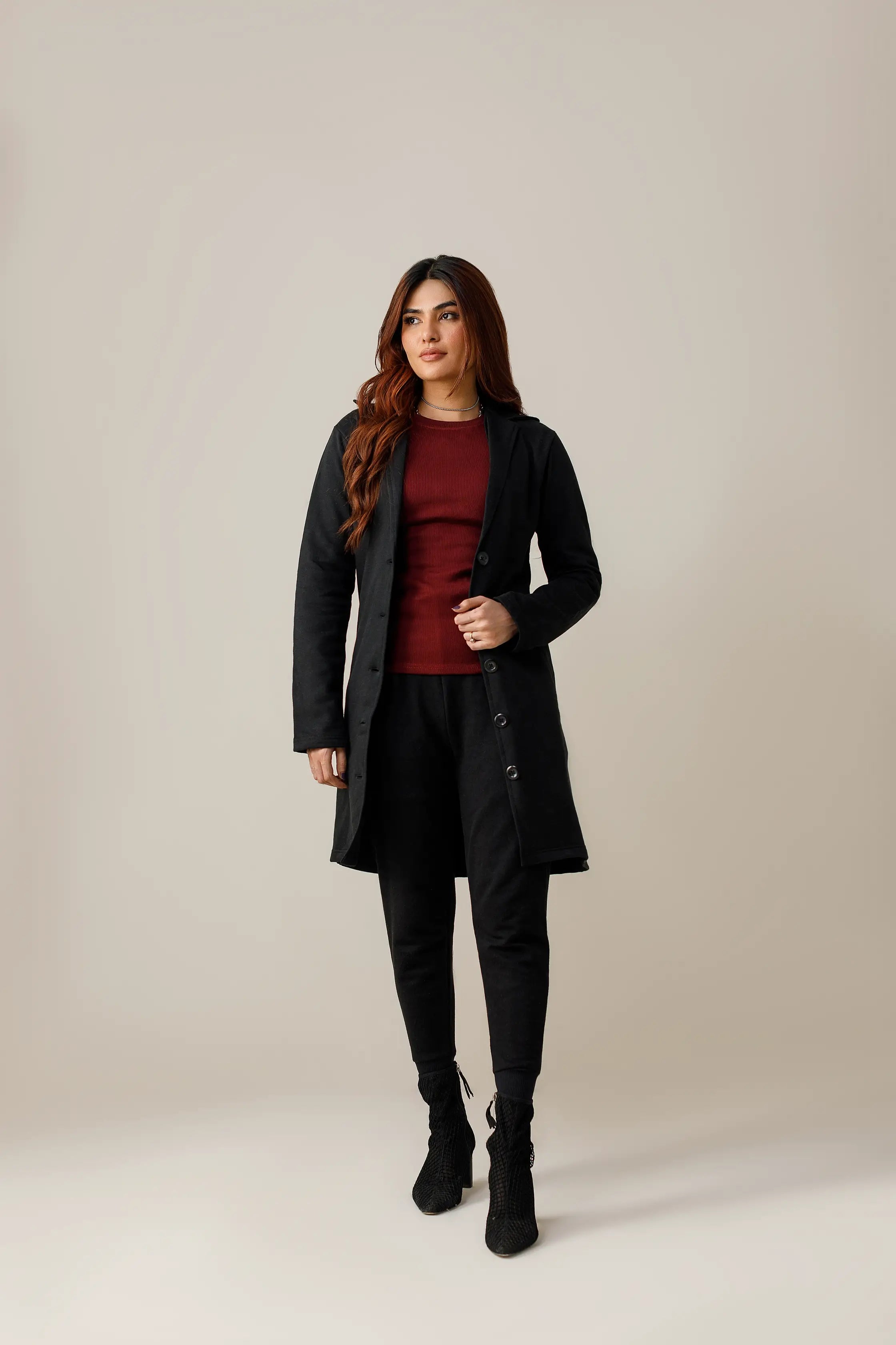 Women's black short lapel coat.