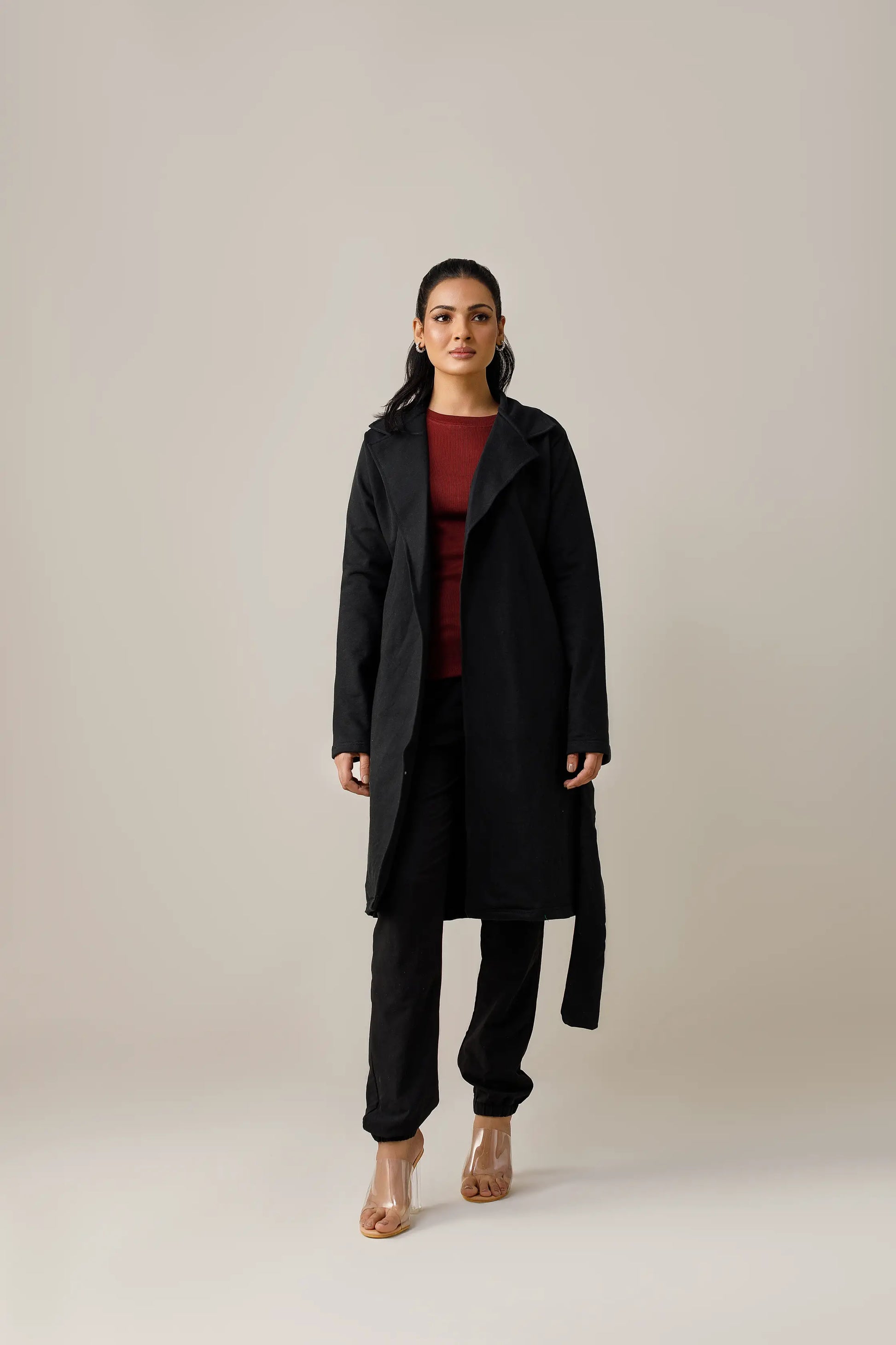 Women's black long lapel coat.