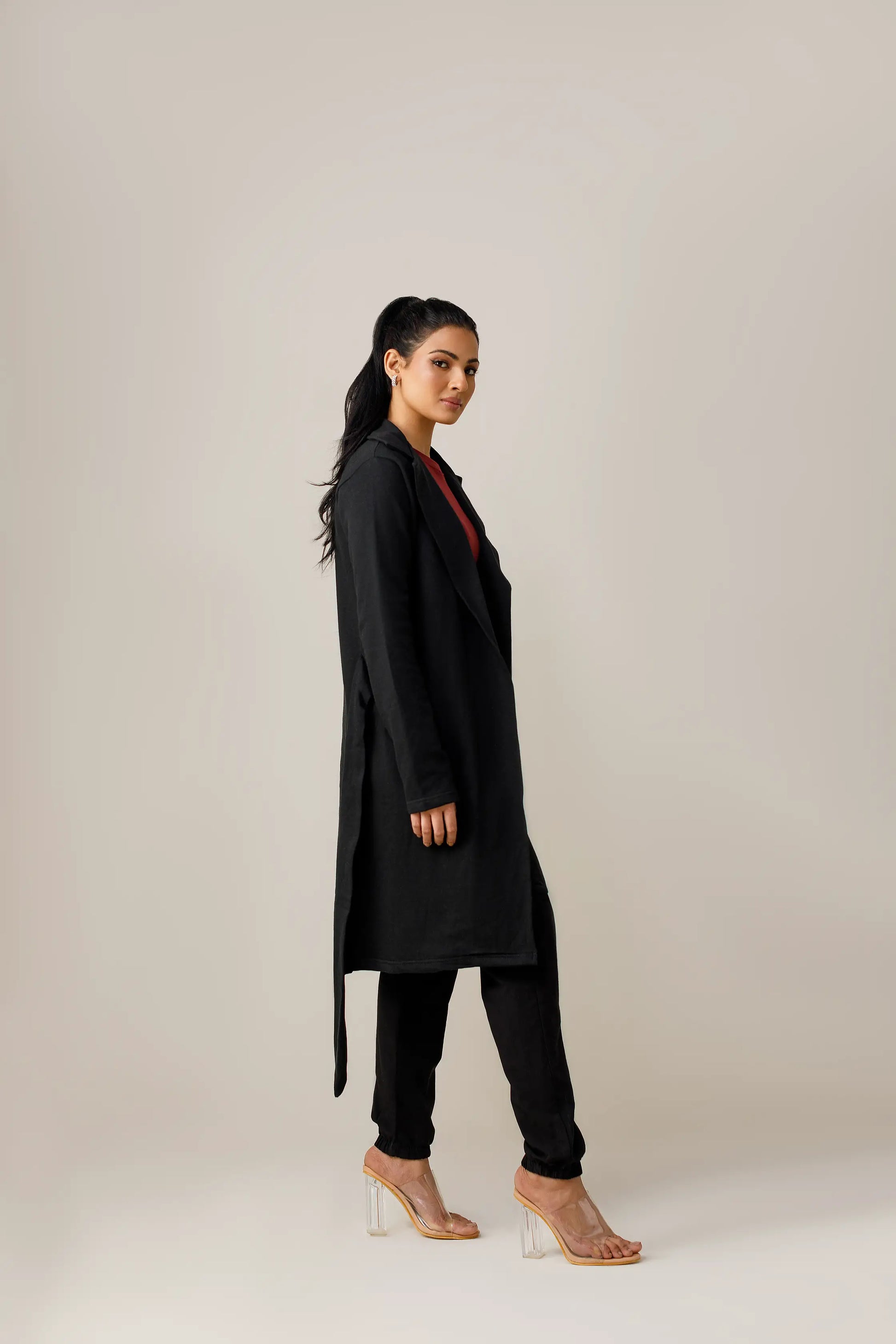 Women's black long lapel coat.