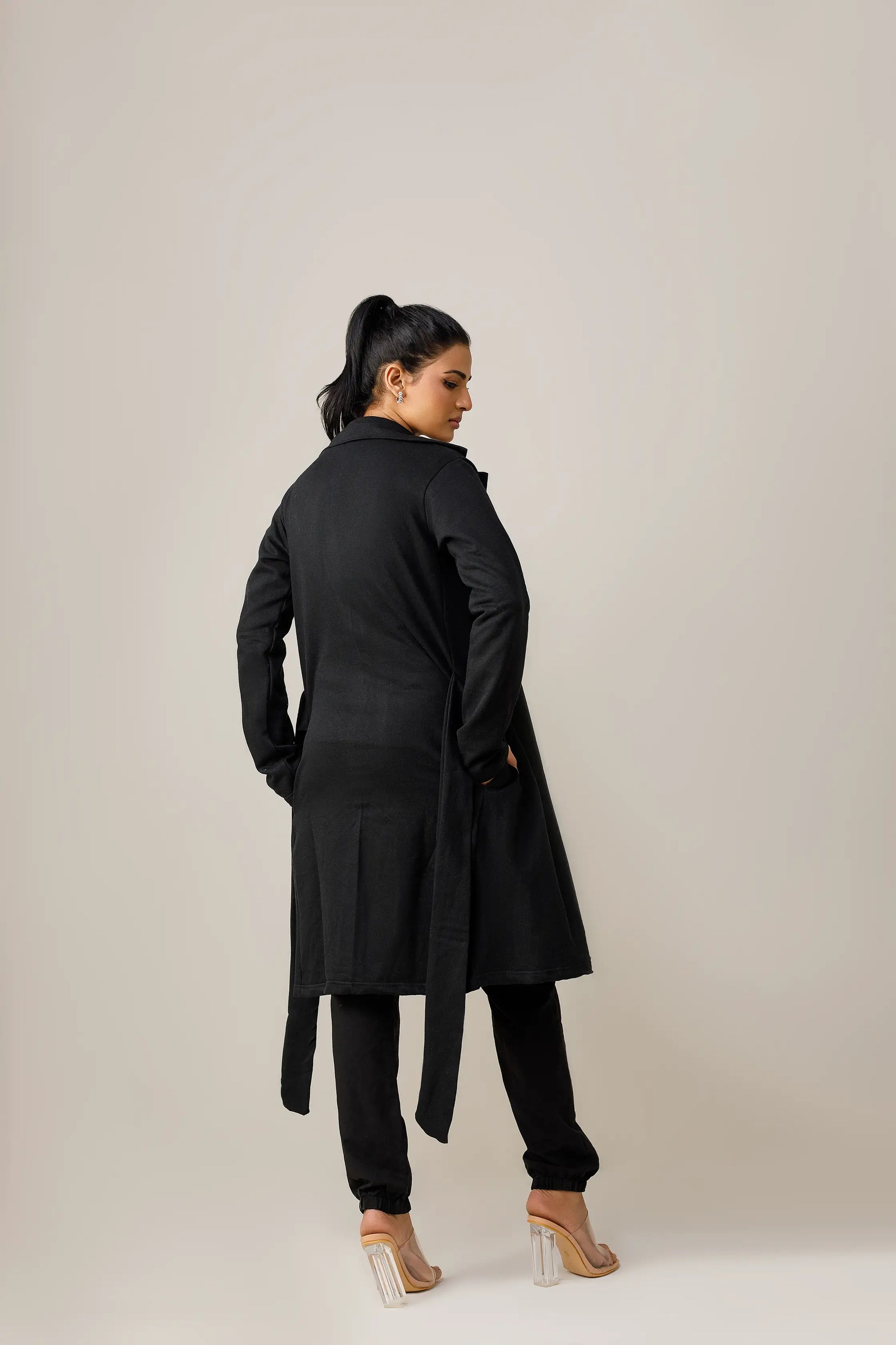 Women's black long lapel coat.