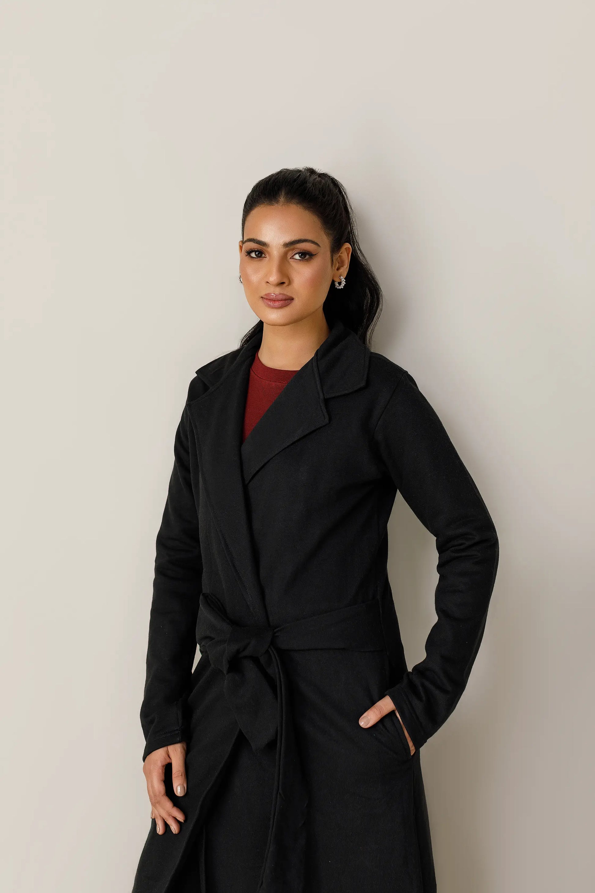 Women's black long lapel coat.