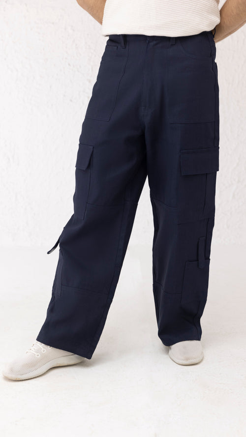 Front view of Aether wide leg cargo pants in navy twill with minimal 4-pocket design – Decuir