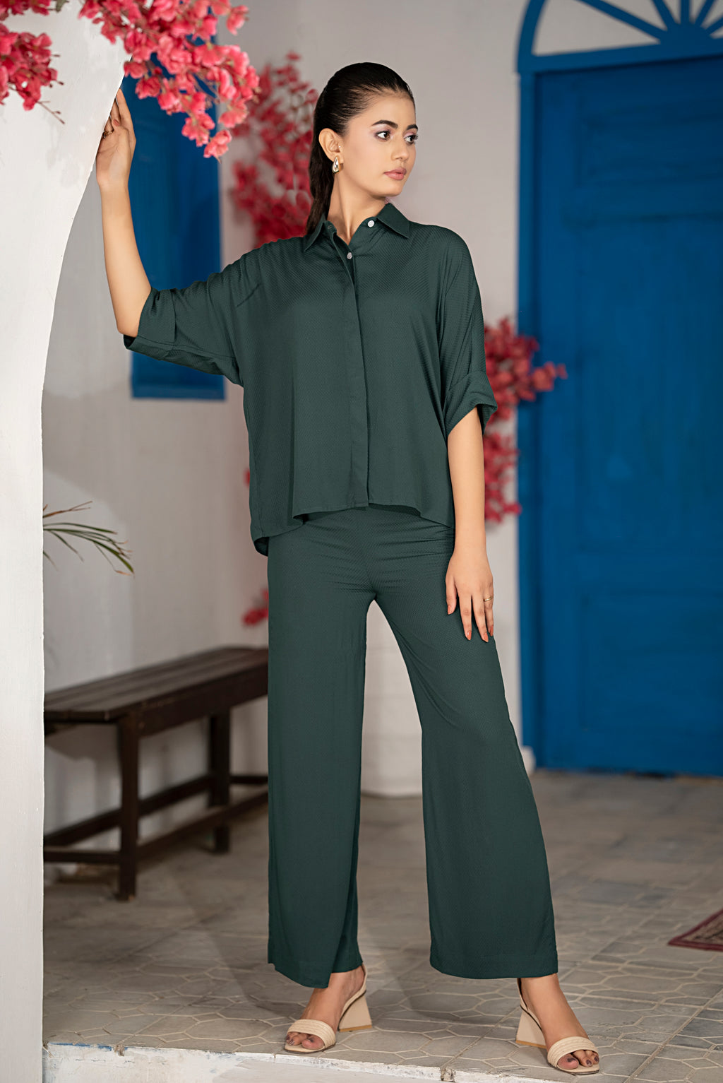 Front view of Emerise Relaxed Co-Ord Set in emerald green with drop shoulder shirt and wide leg pants