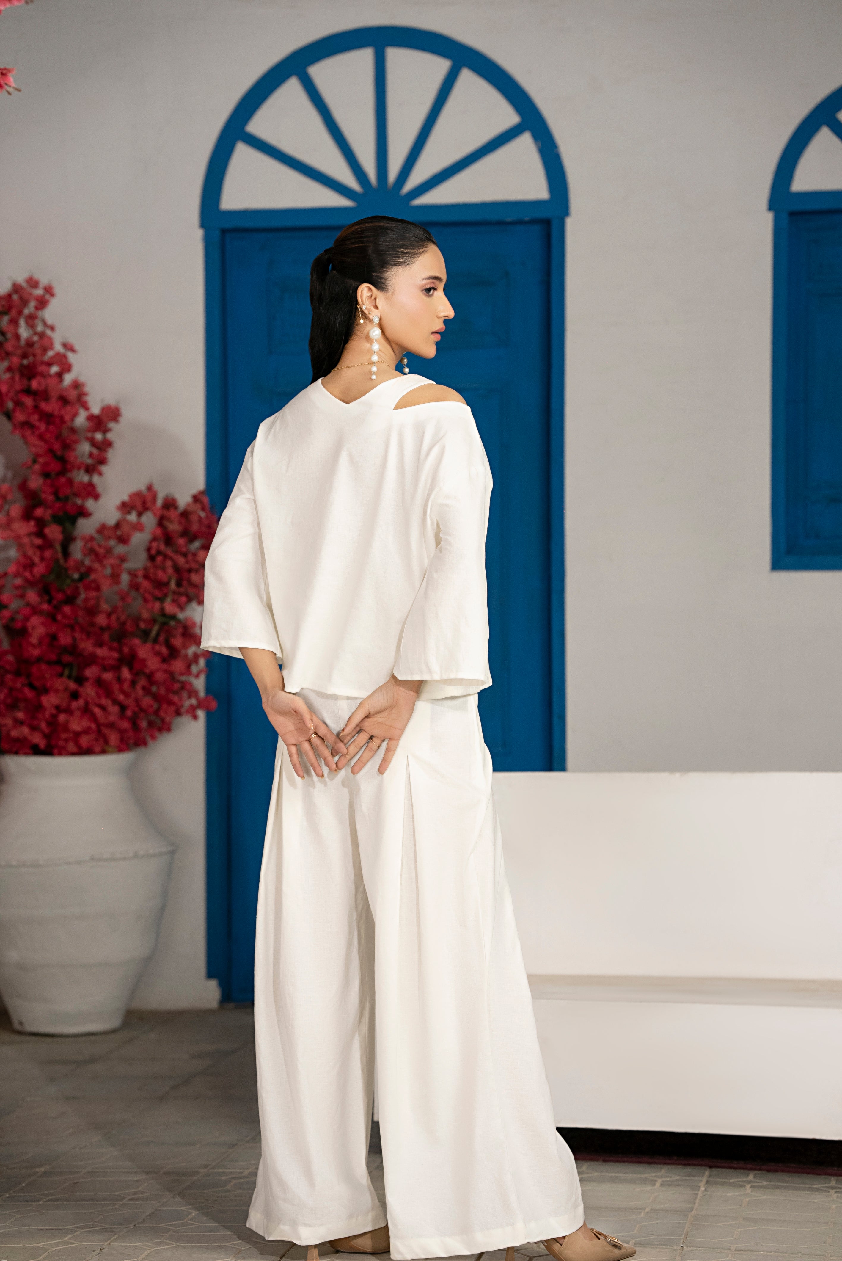 Back view of Ivorycrest Co-Ord Set showcasing off-white flowing fabric and wide-leg silhouette