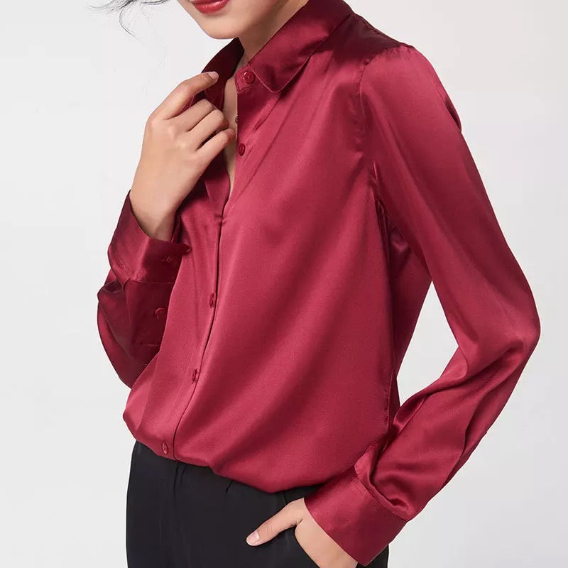 Women's reddish maroon short silk button down shirt. 